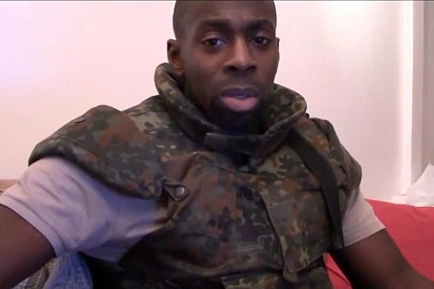 Three men arrested as part of an investigation into the Paris attacks in January in which 17 people were killed are linked to&nbsp;Amedy Coulibaly (above), one of the three Islamist militant gunmen who perpetrated the attacks,&nbsp;the Paris prosecut