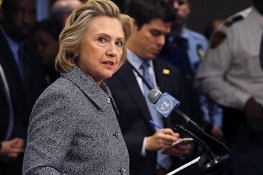 Former US secretary of state Hillary Clinton speaks during a news conference at the United Nations in New York, in this March 10, 2015, file photo. A US congressional panel investigating the 2012 Benghazi attacks called for Hillary Clinton on Tuesday