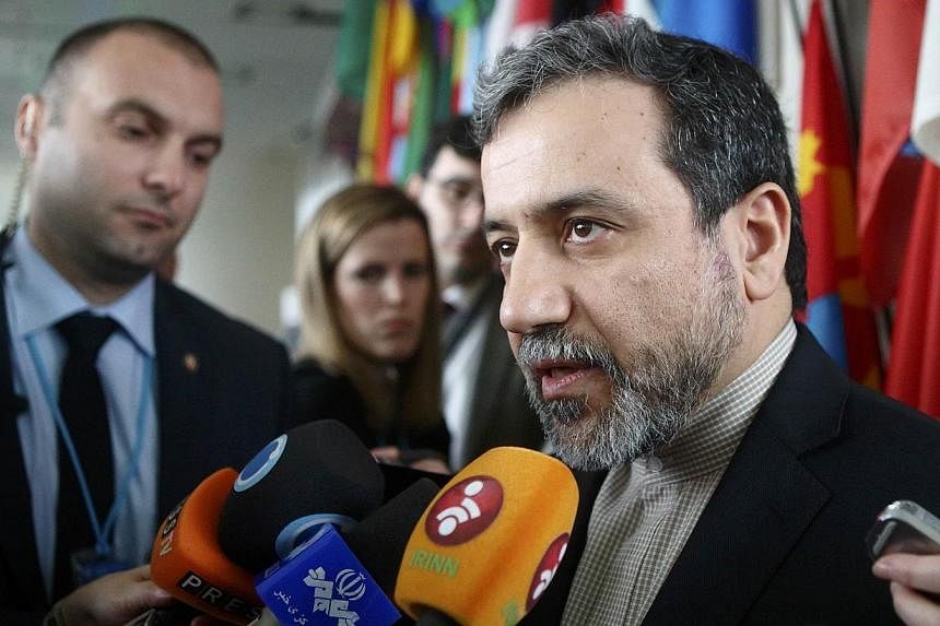 Iran's chief nuclear negotiator Abbas Araghchi said on Wednesday, April 1, 2015, that "problems" remain in nuclear talks with world powers and that there can be no deal without a "framework for the removal of all sanctions". -- PHOTO: REUTERS