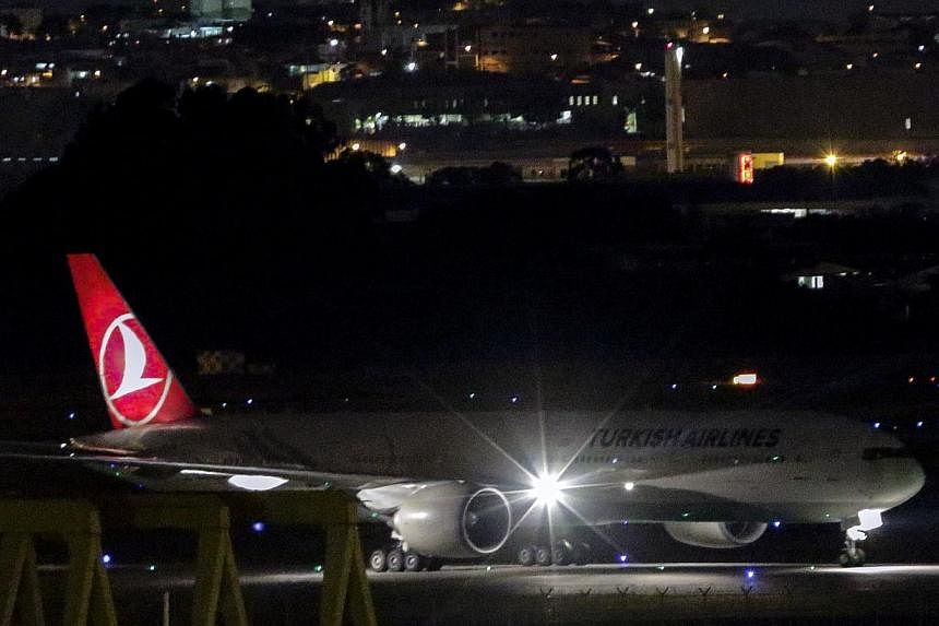 Turkish Airlines flight TK15 landing in Sao Paulo on March 30, 2015.&nbsp;A Turkish Airlines flight to Lisbon was diverted back to Istanbul on Wednesday after unaccompanied baggage was found on board, a spokesman told Reuters. -- PHOTO: AFP