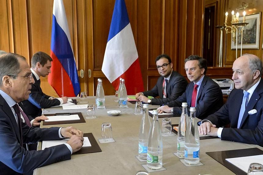 French Foreign Minister Laurent Fabius (right) speaking with his Russian counterpart Sergei Lavrov (left) and their delegations during Iran nuclear talks, on March 30, 2015. Mr Fabius&nbsp;said on Wednesday, April 1, that talks between Iran and world