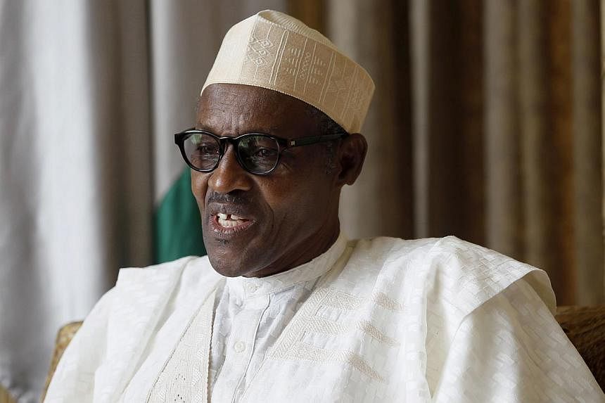 Muhammadu Buhari (above), the winner on Tuesday of Nigeria's most closely fought presidential election, had a harsh anti-corruption stance when he was last in power that made him many political enemies in a country where graft is widespread.. -- PHOT