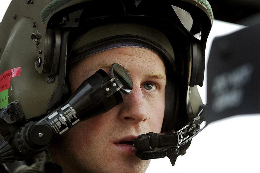 Prince Harry, who graduated from the elite Sandhurst military academy and served twice in Afghanistan, will also spend time with wounded and ill service personnel, whose rights he has long championed. -- PHOTO: REUTERS