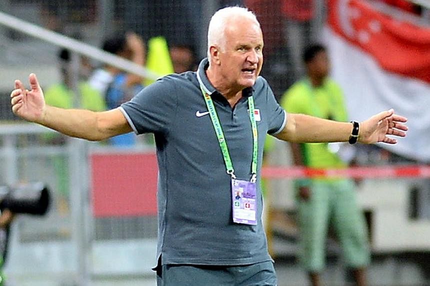 Singapore coach Bernd Stange urging his players during the Group B match of the AFF Suzuki Cup between Singapore and Maynmar held at the National Stadium at the Singapore Sports Hub on Nov 26, 2014. -- PHOTO: BH FILE&nbsp;