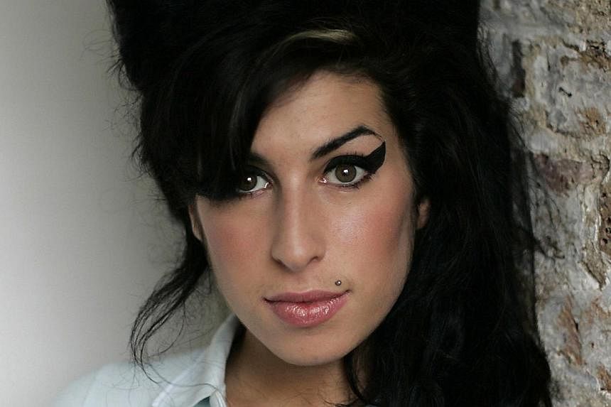 A new documentary on the life of late British singer Amy Winehouse (above) shows the six-time Grammy-Award winner in her younger days discussing her misgivings about fame, a preview of the trailer showed on Thursday. -- PHOTO:&nbsp;UNIVERSAL ISLAND