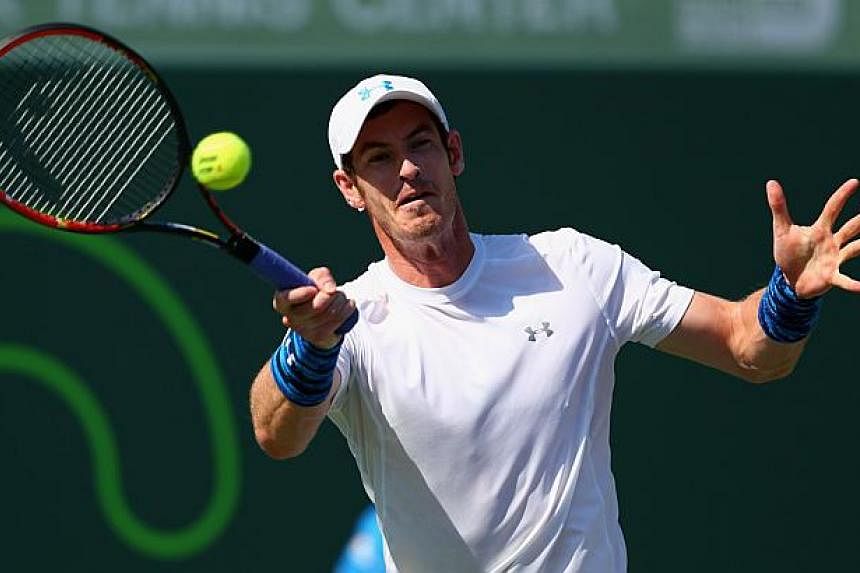 Andy Murray plays a forehand against Dominic Thiem of Austria in their quarter final match on April 1, 2015. Murray shook off a sluggish start to defeat Austrian Dominic Thiem 3-6, 6-4, 6-1 on Wednesday and reach the semi-finals of the Miami Masters.