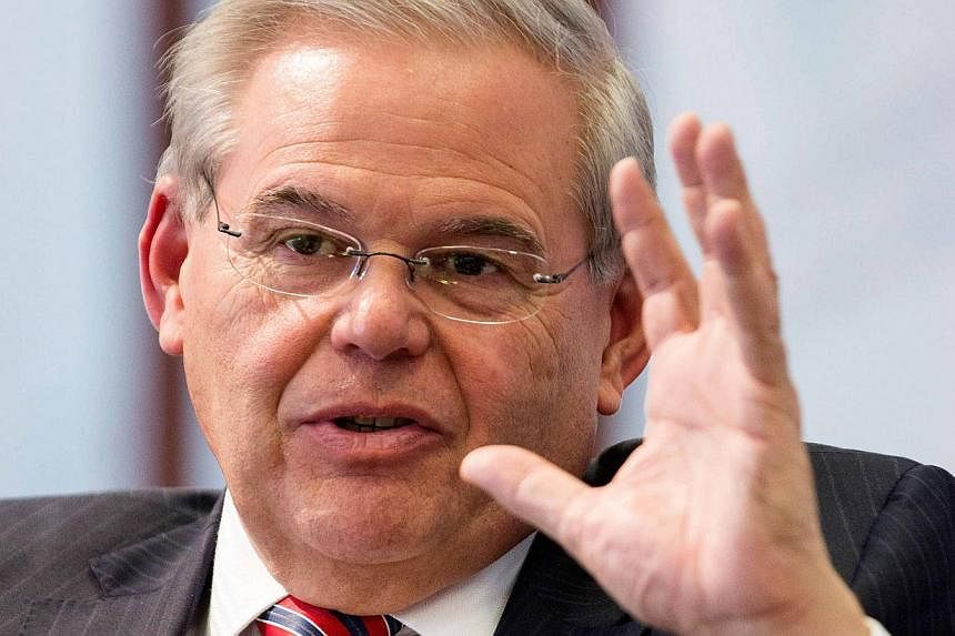 US Senator Robert Menendez (above) was indicted Wednesday on charges of public corruption, following a two-year federal investigation into his ties to a friend who contributed large sums to his re-election campaign. -- PHOTO: REUTERS