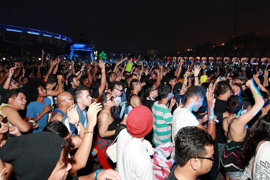 Concert-goers at the Bukit Jalil National Stadium in Kuala Lumpur, Malaysia for the Future Music Festival Asia 2014.&nbsp;The Future Music Festival, which was denied a licence to stage the show here this year, will be discontinued in Asia and Austral