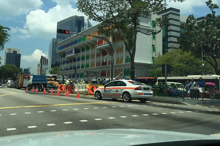 Police vehicles at the road worksite on Hill Street. -- PHOTO: IRENE HOE