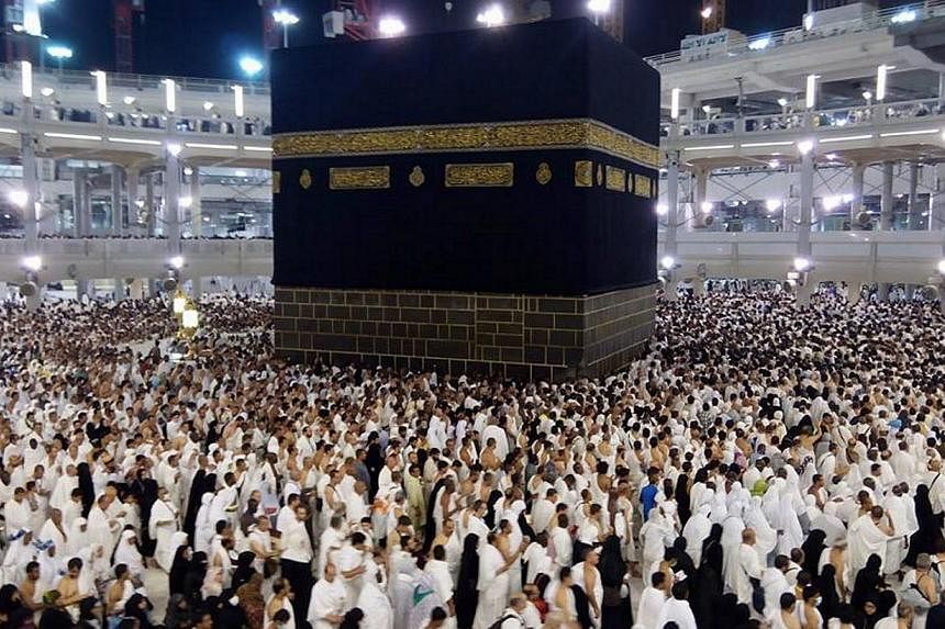 Muslim pilgrims performing the annual 'Haj' pilgrimage at the holy Kaaba in the Grand Mosque in Mecca, Saudi Arabia in 2014.&nbsp;The Muslim and Christian populations could be nearly equal by 2050, with Islam expected to be the fastest-growing faith 