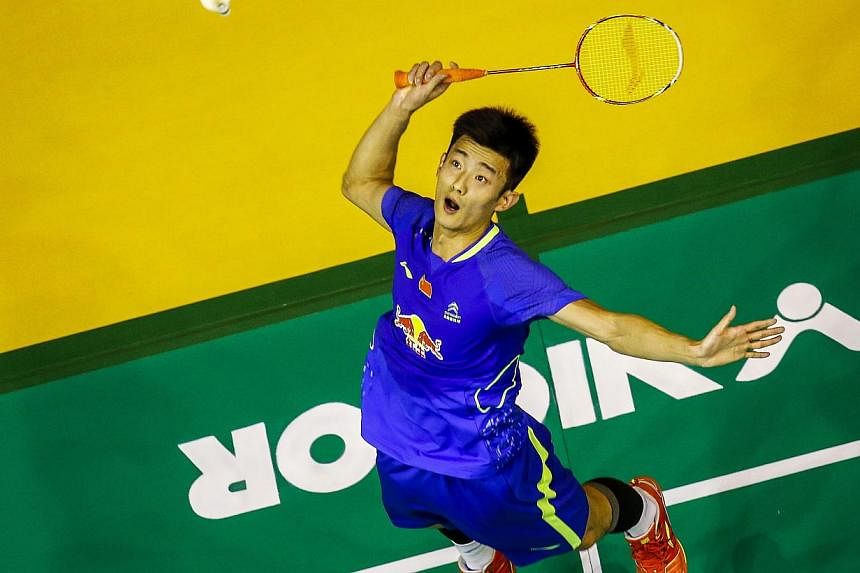 Chen Long of China in action against Parupalli Kashyap of India (not pictured) during the Men's single qualifying match of the Badminton Malaysian Open at Putra Stadium in Kuala Lumpur, Malaysia, on April 2, 2015. The badminton world No. 1 joined his