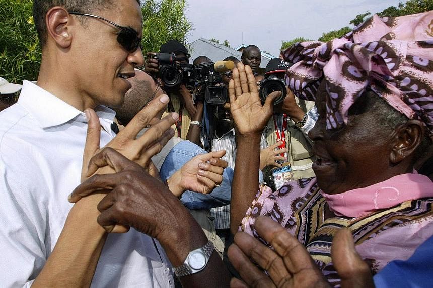 In this Aug 26, 2006 file photo, then US senator Barack Obama greets his grandmother Sarah Obama at their rural home in Siaya, Kisumu, 365km west of the capital Nairobi. US&nbsp;President Obama's Kenyan grandmother has welcomed his planned visit to t