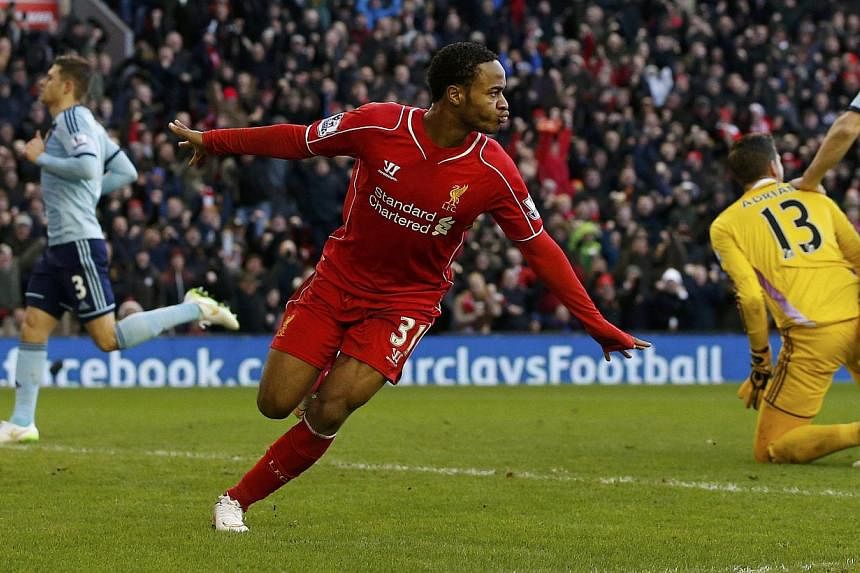 Liverpool's Raheem Sterling in action against West Ham United on Jan 31, 2015. Sterling rejected suggestions he was "money-grabbing" in an interview aired on Wednesday, after his talks over a new contract reportedly hit an impasse. -- PHOTO:&nbsp;REU