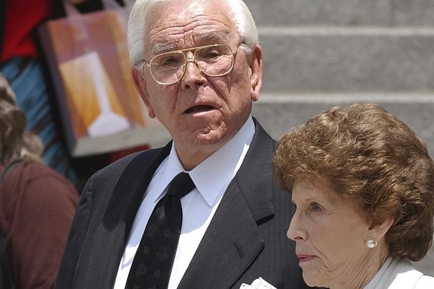 Televangelist Robert Schuller and his wife Arvella arrive for a memorial service for the late actor Gregory Peck in Los Angeles, in this file photo taken June 16, 2003. Schuller, known worldwide for his weekly Hour Of Power broadcasts, died in Southe