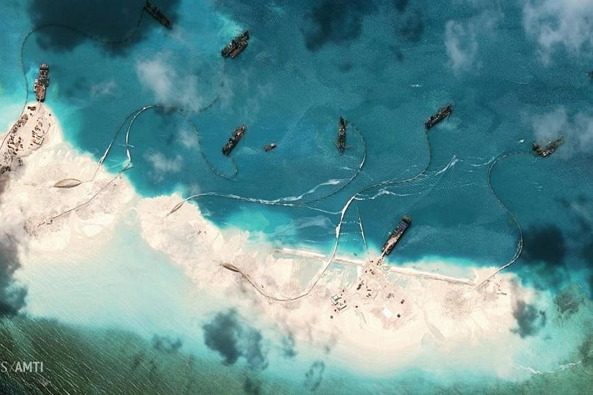 Dredgers deposit sand on the northern rim of the Mischief Reef, located 216km west of the Philippine island of Palawan, in this image provided by the&nbsp;Centre for Strategic and International Studies (CSIS) Asia Maritime Transparency Initiative on 
