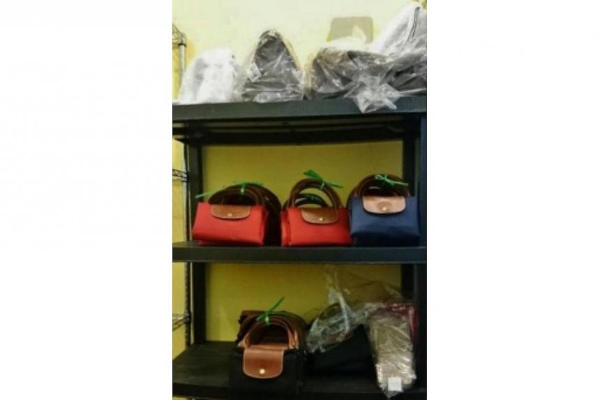 Two handbag retailers fined for GST evasion The Straits Times