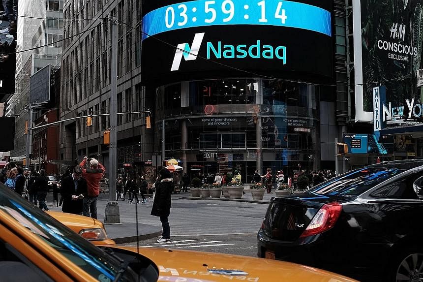 Nasdaq sets new record 15 years after dot-com crash | The Straits Times