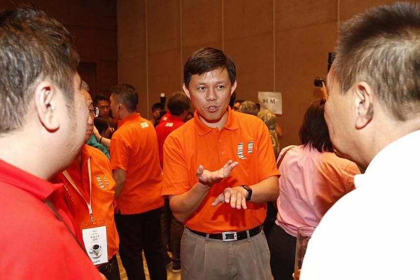 Mr Chan Chun Sing, who will be the new labour chief, mingling after the May Day celebration. -- ST PHOTO: KEVIN LIM