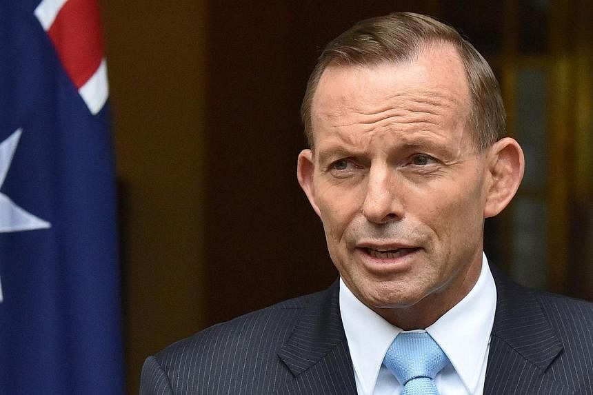 Tony Abbott, Australia's prime minister, speaks during a news conference at Parliament House in Canberra, Australia, on Monday, Feb 9, 2015. -- PHOTO: BLOOMBERG