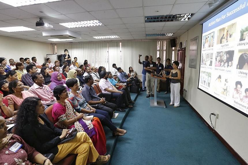 Around 65 members of the Indian community met on Saturday morning to discuss active ageing at the Singapore Indian Development Association (Sinda) building at Beatty Road. -- ST PHOTO: KEVIN LIM