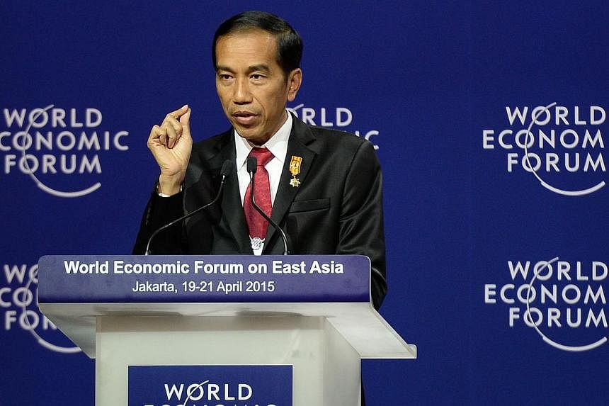 Indonesian President Joko Widodo speaking during the World Economic Forum on East Asia in Jakarta on April 20, 2015. While many Indonesians applauded the President's resolve in the mass executions of drug offenders, Indonesia's image overseas has bee