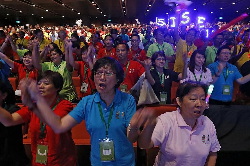 More than 4,000 unionists, employers and government officials attended the May Day Rally yesterday at The Star Performing Arts Centre, where Prime Minister Lee Hsien Loong urged everyone to "continue joining hands to achieve better lives for all Sing
