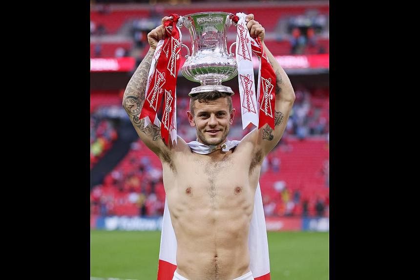 Despite an injury-plagued season, Jack Wilshere is relishing the challenge for first-team spots among the glut of talented Arsenal midfielders next season.