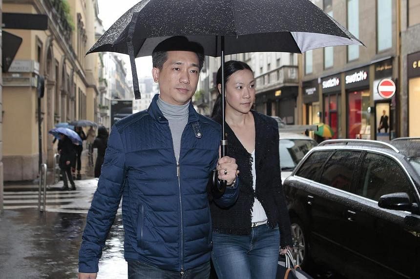 Thai businessman Bee Taechaubol walks with his wife in Milan, Italy, on April 27, 2015. Bee&nbsp;will on Saturday purchase a controlling 51 per cent stake in ailing Serie A giants AC Milan from club owner Silvio Berlusconi, Italian media report.&nbsp