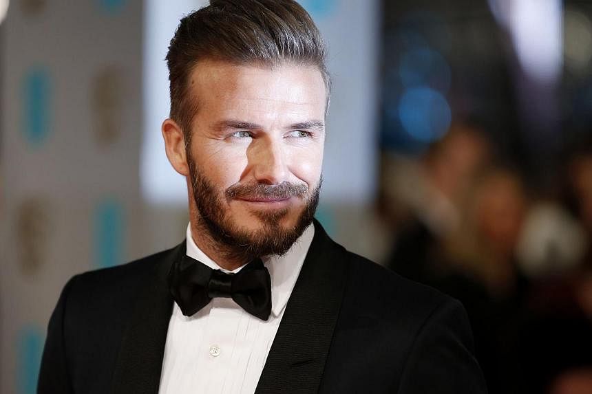 David Beckham (above, in February) will celebrate his 40th birthday on Saturday with a star-studded bash in Morocco as the Manchester United and England legend shows retirement has done little to diminish his love of the limelight. -- PHOTO: AFP