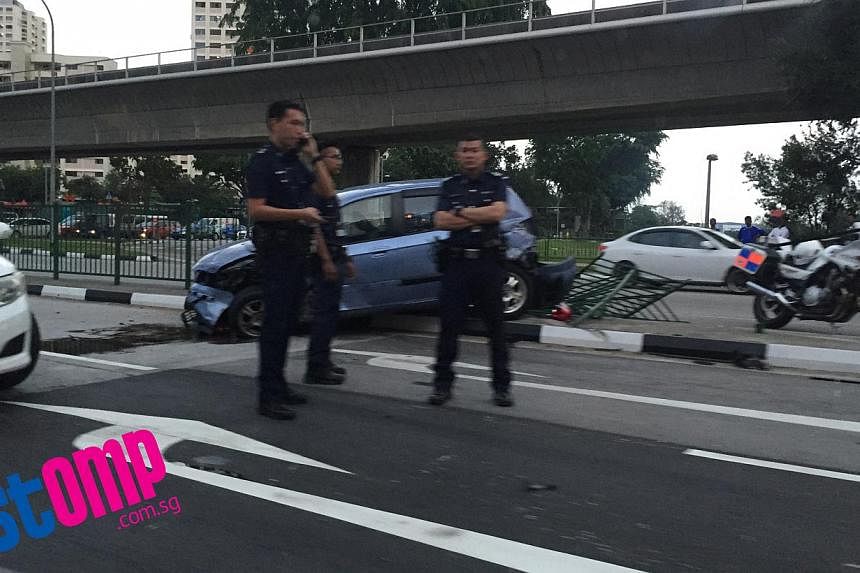 A three-car accident at Boon Lay Way on Friday was caused by a suspected drug trafficker who was trying to evade arrest. -- PHOTO: STOMP