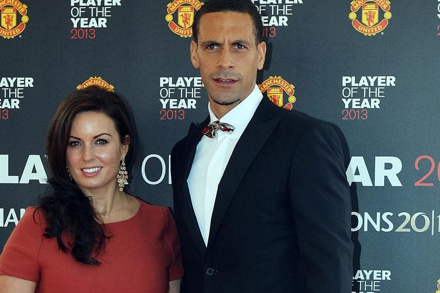 Rio Ferdinand and wife Rebecca Ellison arrive for the Player of the Year awards in Manchester, north-west England, on May 15, 2013.&nbsp;Football rallied round on Saturday to offer support to former England captain Ferdinand following the death of hi