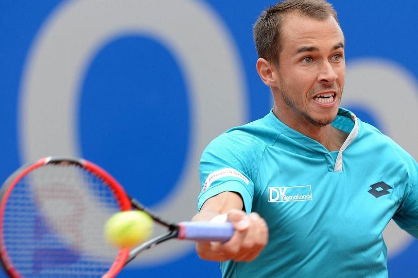 Andy Murray defended his astonishing outburst at Lukas Rosol (above) on Saturday when he told the controversial Czech he was the tour's most hated man. -- PHOTO: AFP