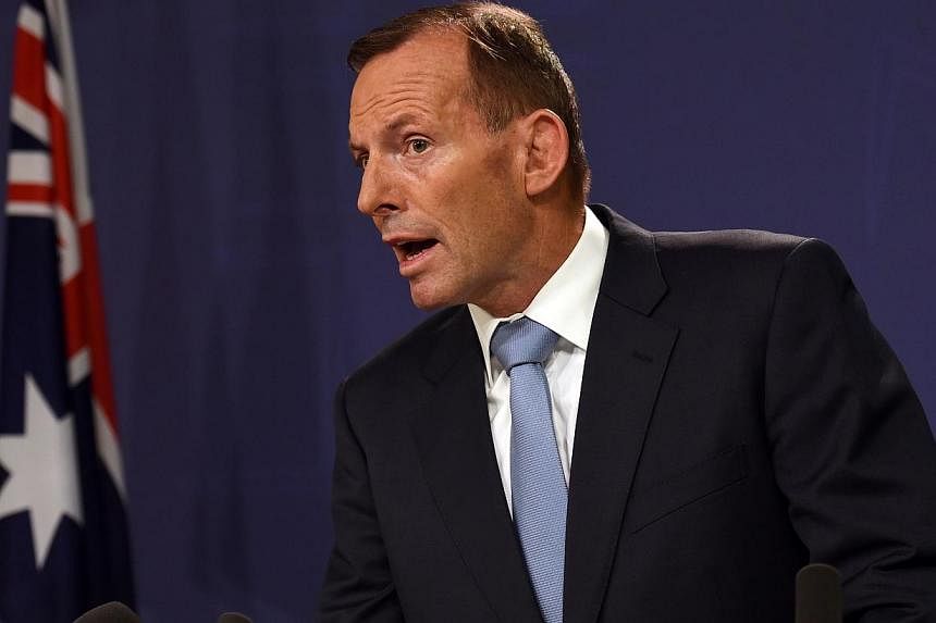 Australian Prime Minister Tony Abbott on Monday said Australia and Europe were in talks on how to stop asylum-seeker boats after the success of his government's controversial polices on the issue. -- PHOTO: AFP