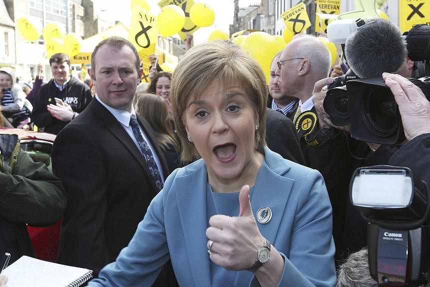 Nicola Sturgeon, the leader of the Scottish National Party (SNP), gives a thumbs up while campaigning in Musselburgh, Scotland, Britain on May 1, 2015. -- PHOTO: REUTERS&nbsp;