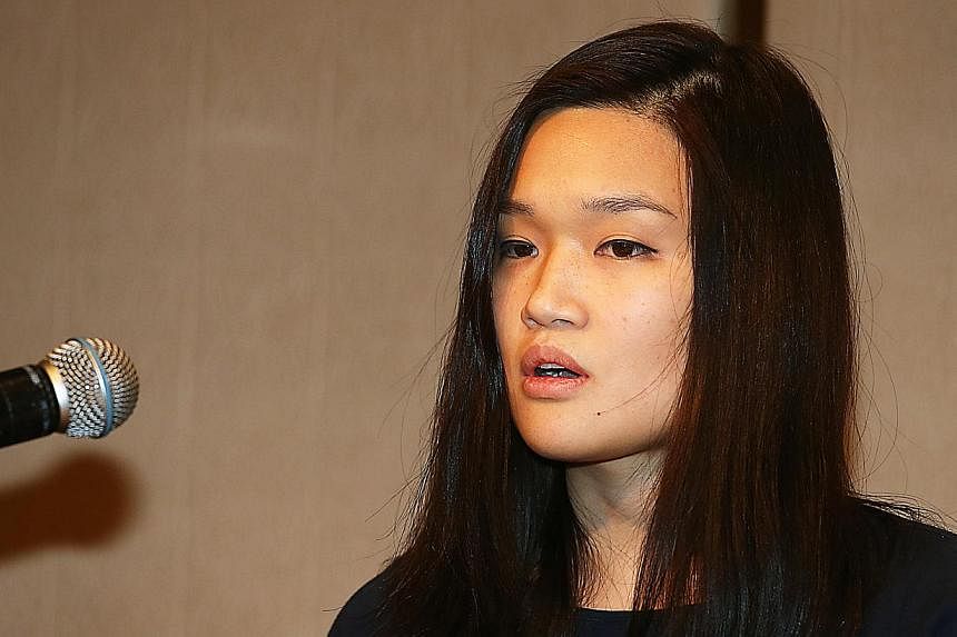 Kidnapped victim Queenie Rosita Law, granddaughter of Bossini clothing chain founder Law Ting Pong, speaks to the media at the Four Seasons Hotel in Central, Hong Kong on April 30, 2015. Hong Kong police on Monday arrested one of six suspects who fle