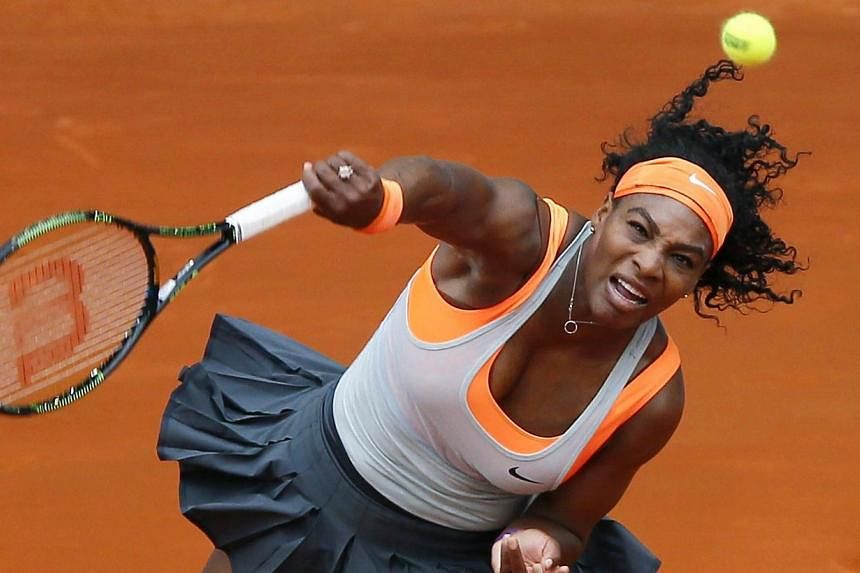 US tennis player Serena Williams returns the ball to her countryman Madison Brengle during the second jouney of the Madrid Mutua Open tennis tournament match &nbsp;in Madrid, Spain on Sunday. -- PHOTO: &nbsp;EPA