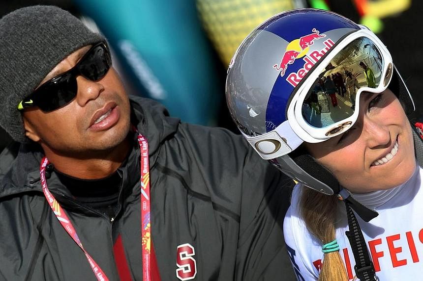 Lindsey Vonn of USA and her boyfriend at the timeTiger Woods after the womens giant slalom at the Alpine Skiing World Championships in Vail, Colorado in February. Vonn and Woods have ended their relationship according to media. -- PHOTO: EPA