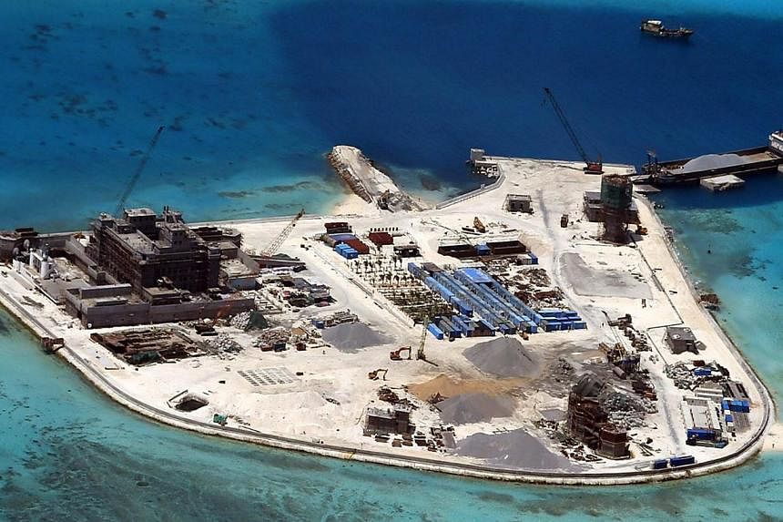 China has accused the Philippines of violating a 13-year-old informal code of conduct in the South China Sea with its building work on disputed islets, firing back again after repeated criticism of China's own construction work. -- PHOTO: EPA