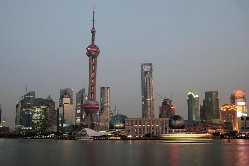 The Pudong financial area in Shanghai in 2008. The financial hub has banned spouses and children of senior officials from private business, making the city the first to impose such strict controls over the family wealth of Communist Party cadres. -- 