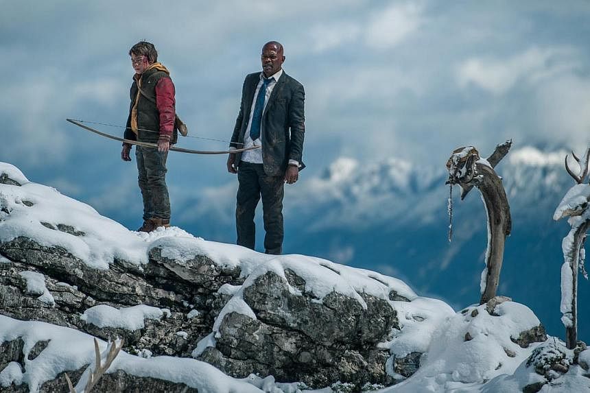 Onni Tommila (left) as the 13-year-old who stumbles upon the American president (Samuel L. Jackson, right) in the Finnish forest and has to keep him safe. -- PHOTO: GOLDEN VILLAGE PICTURES