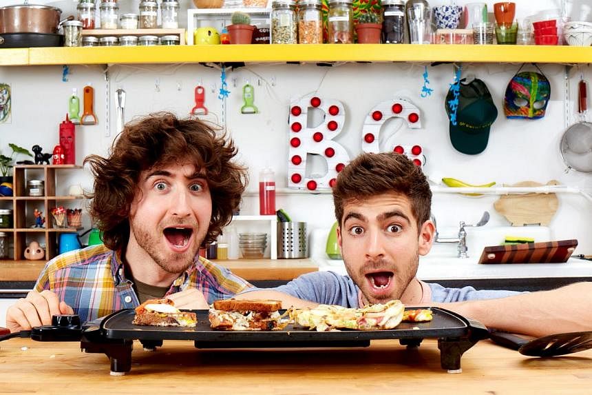 Josh (far left) and Mike Greenfield got their new TV show after their tutorial videos of easy-to-cook meals on YouTube caught the attention of a production house.