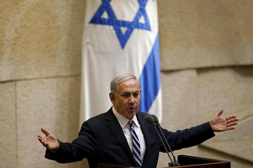 Israeli Prime Minister Benjamin Netanyahu was on Wednesday locked in a last-ditch effort to piece together a ruling coalition with a working majority ahead of a midnight deadline. -- PHOTO: REUTERS