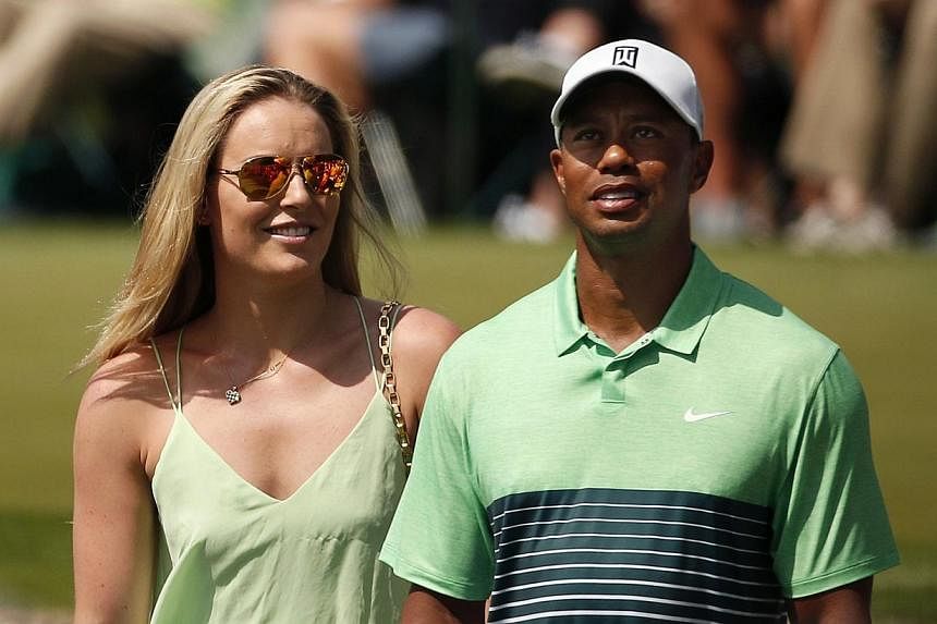 Skier Lindsey Vonn and golfer Tiger Woods, in better times - during the par 3 event held ahead of the 2015 Masters at Augusta National Golf Course in Georgia on April 8. -- PHOTO: REUTERS