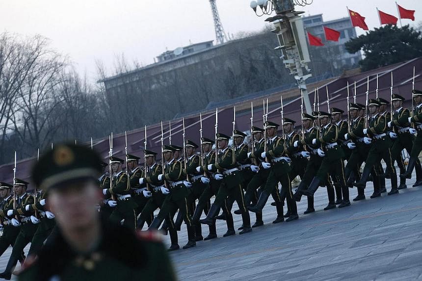 There are some in China's armed forces, the largest in the world, who are not taking the fight against corruption seriously, brushing problems under the carpet and not daring to go after senior officers, its official paper said on Thursday. -- PHOTO: