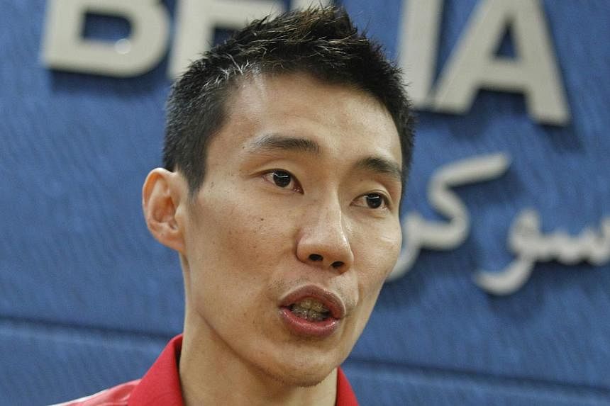 Malaysian badminton player Lee Chong Wei speaking during a press conference in Putrajaya on April 27, 2015. The twice Olympic silver medallist will feature only in the men's team event for next month's SEA Games. -- PHOTO: EPA