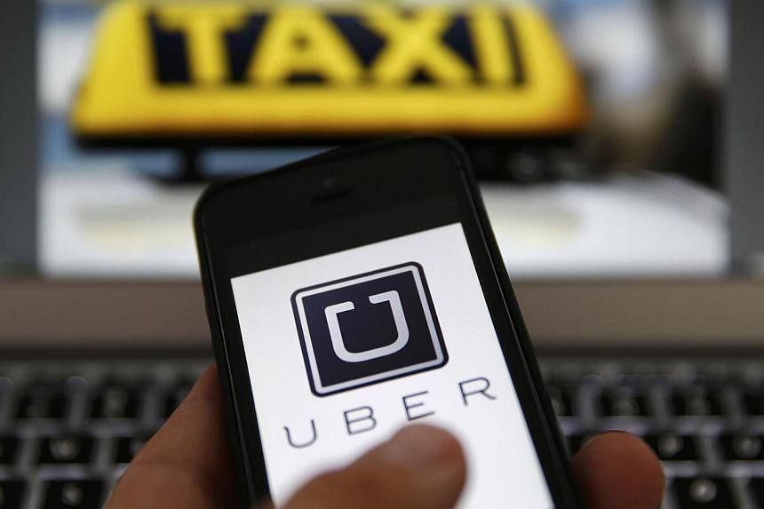 The authorities in China's south-western city of Chengdu visited the offices of Uber on Wednesday as part of a new investigation into the online taxi-hailing service, a spokesman for Chengdu's Transportation Commission said. -- PHOTO: REUTERS&nbsp;