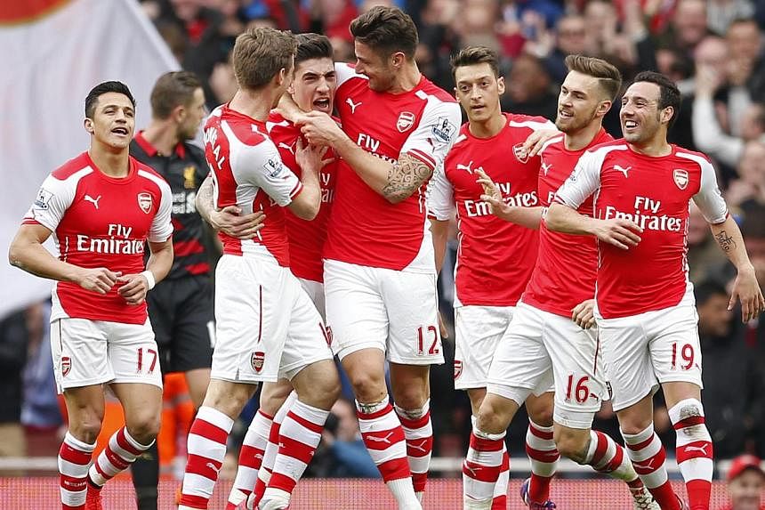 English Premier League sides Arsenal (above), Everton, and Stoke City, as well as a Singapore Select XI, make up the competition's four-team field. -- PHOTO: REUTERS&nbsp;