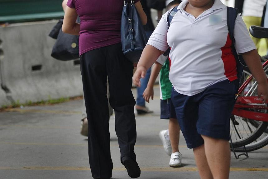 Obese children are far less likely to finish school than peers of normal weight, according to European research on Thursday that also highlighted body image problems in children as young as six. --&nbsp;PHOTO: ST FILE
