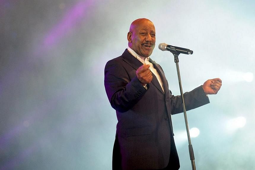Errol Brown, former singer and founder of the British pop band Hot Chocolate, performs on stage during an Open Air New Year's Eve party at the landmark Brandenburg Gate in Berlin on Dec 31, 2011. -- PHOTO: EPA