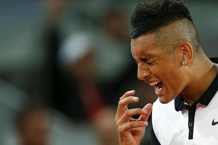 Nick Kyrgios of Australia reacts during his match against Roger Federer of Switzerland at the Madrid Open tennis tournament in Madrid. -- PHOTO: REUTERS